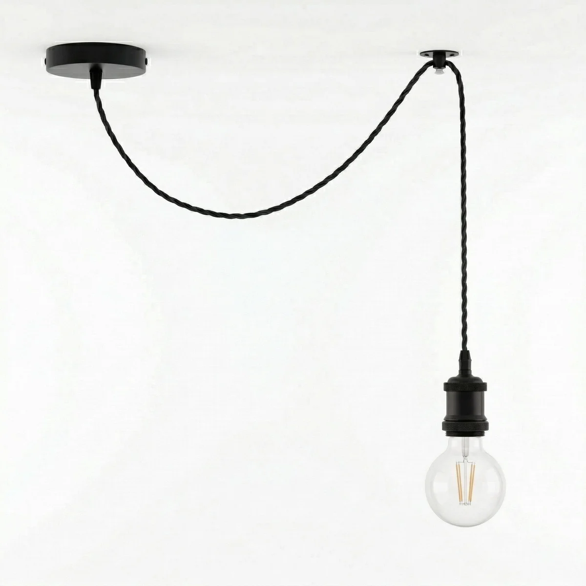 Black industrial pendant light with adjustable 2m twisted fabric cable and included amber G80 LED filament bulb