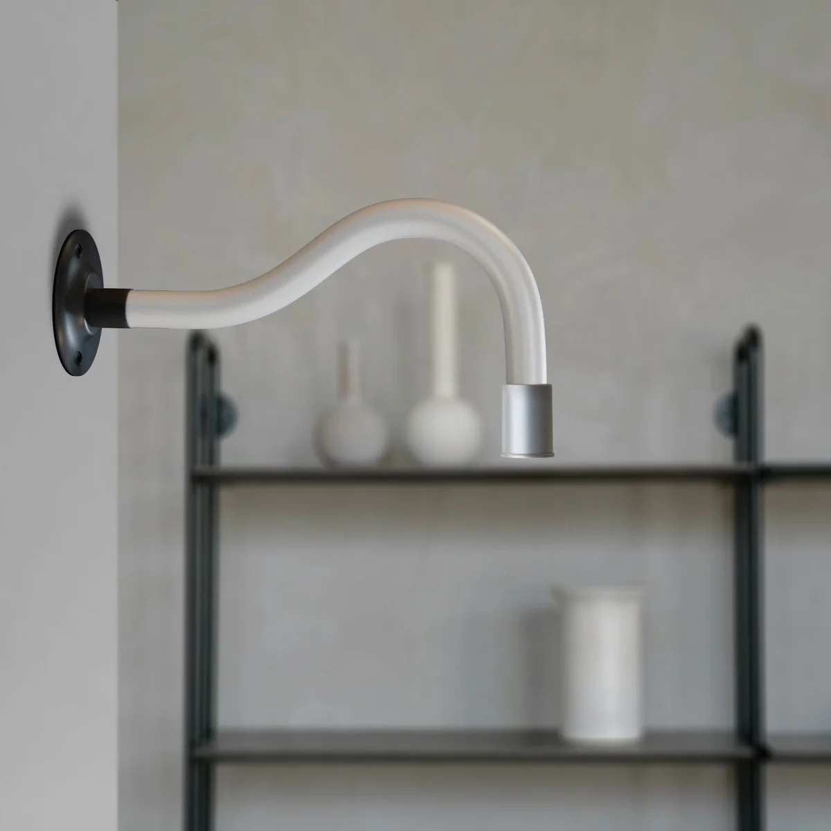 220mm swan neck conduit pipe metal fitting with male thread, showing curved design for cable routing and durability